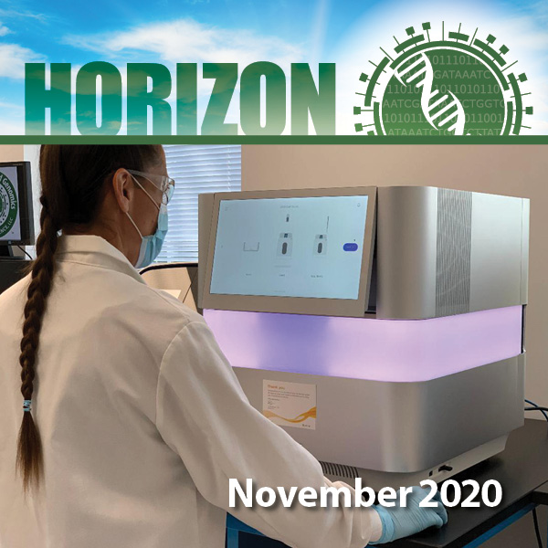 Technician working on Illumina iScan with text "Horizon: November 2020"